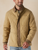 The front view of a tan canvas liner jacket from The Normal Brand. Showing full button closure down the entire front of the coat.