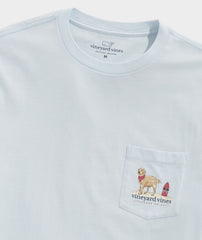 A good golden retriever acting as a lifeguard, on the front of a blue Vineyard Vines t-shirt.