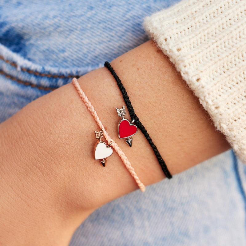 Pura Vida Lovestruck Silver/Red Charm Bracelet on a model. Pura Vida Lovestruck Silver/Red Charm Bracelet on a model.