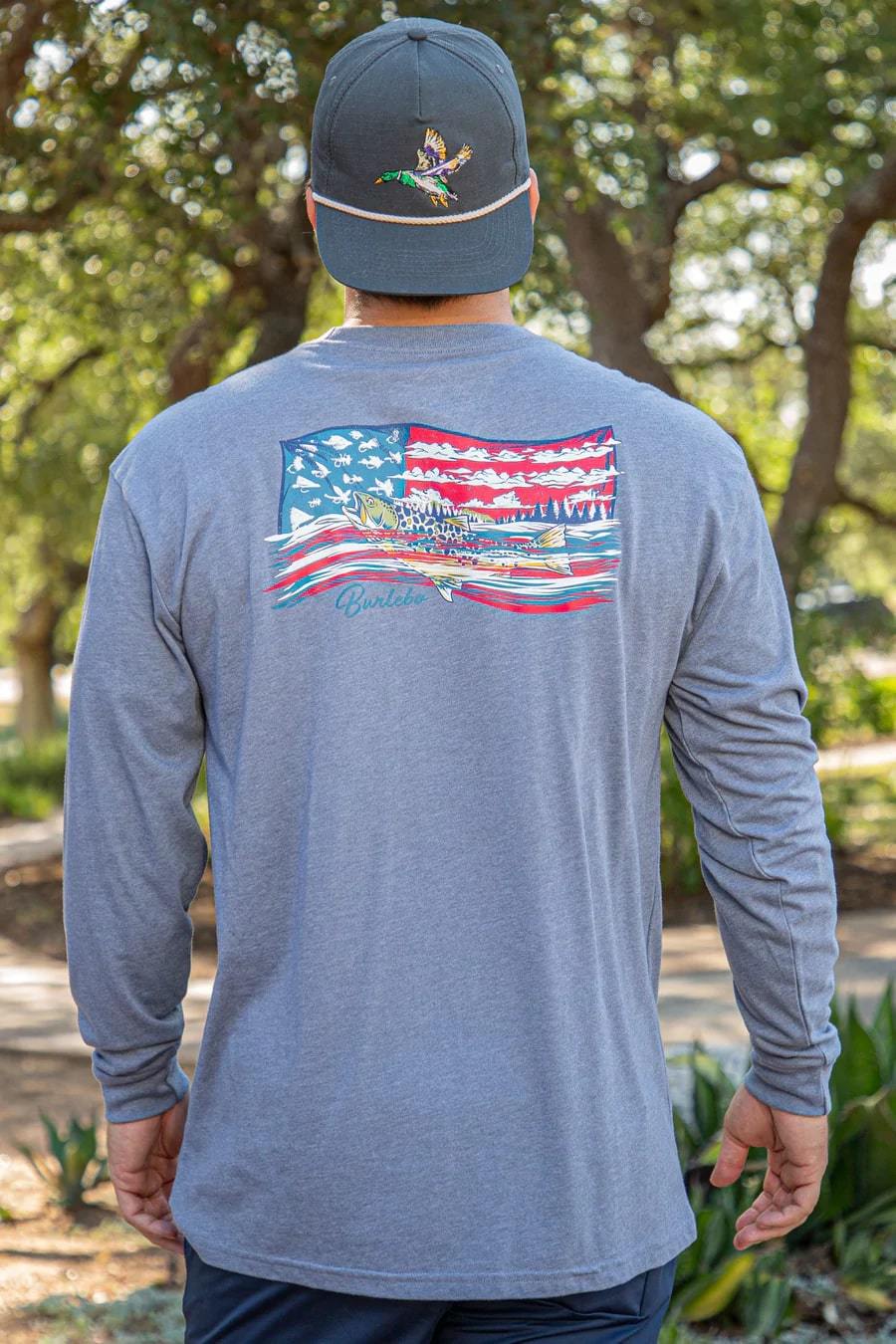 A view of the back of the Burlebo flag t-shirt, featuring a cool American flag design with a fish jumping through water