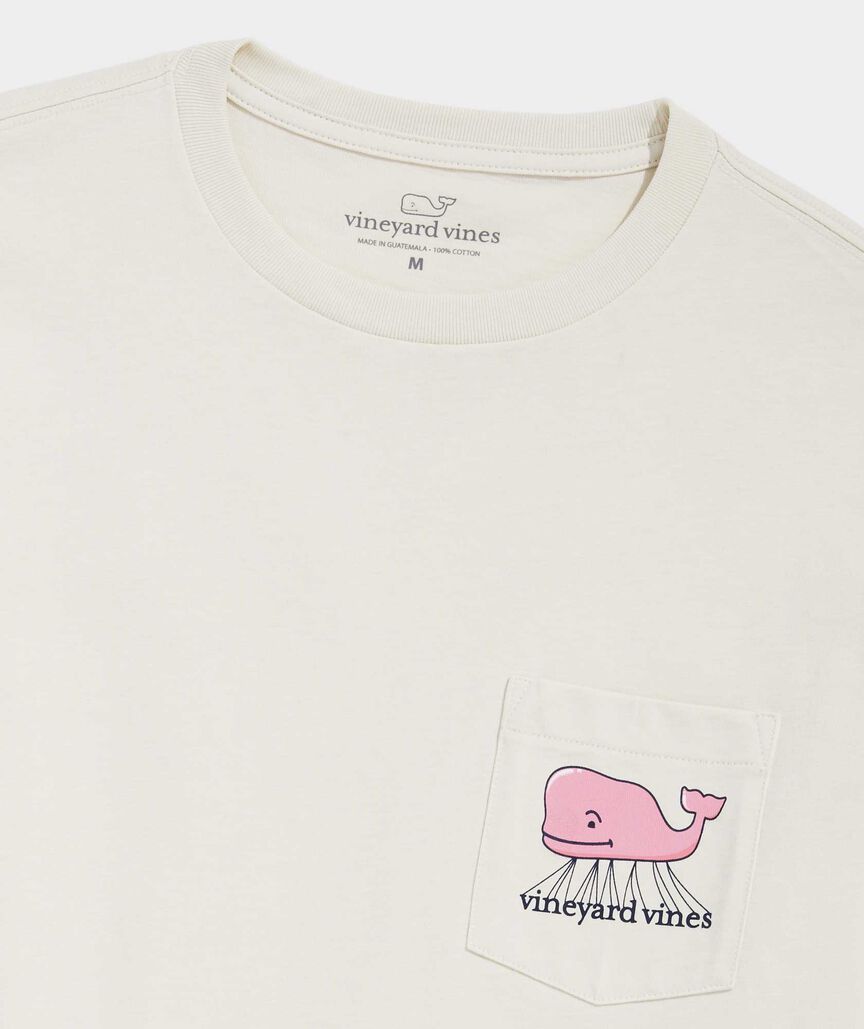 The chest pocket of the t-shirt featuring the Vineyard Vines whale logo as a parade float.