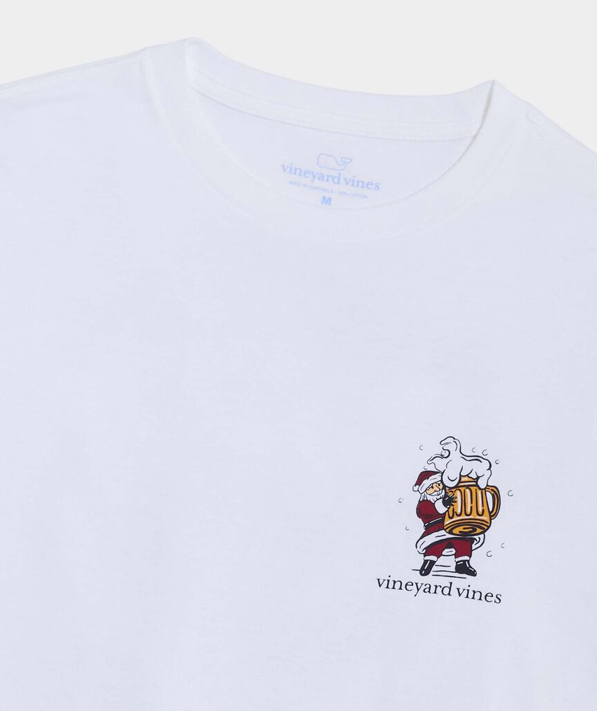 White long sleeve t-shirt with Santa Clause holding a mug of beer. The words "It's the most wonderful time for a beer." and the Vineyard Vines logo are shown.