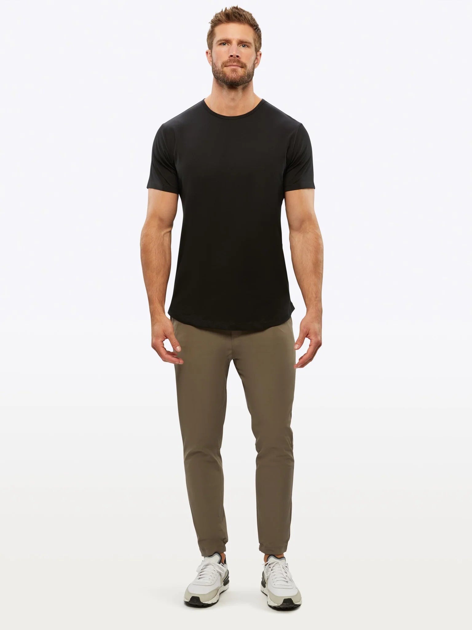 CUTS Clothing Men's AO Curve Hem T-shirt in color black.