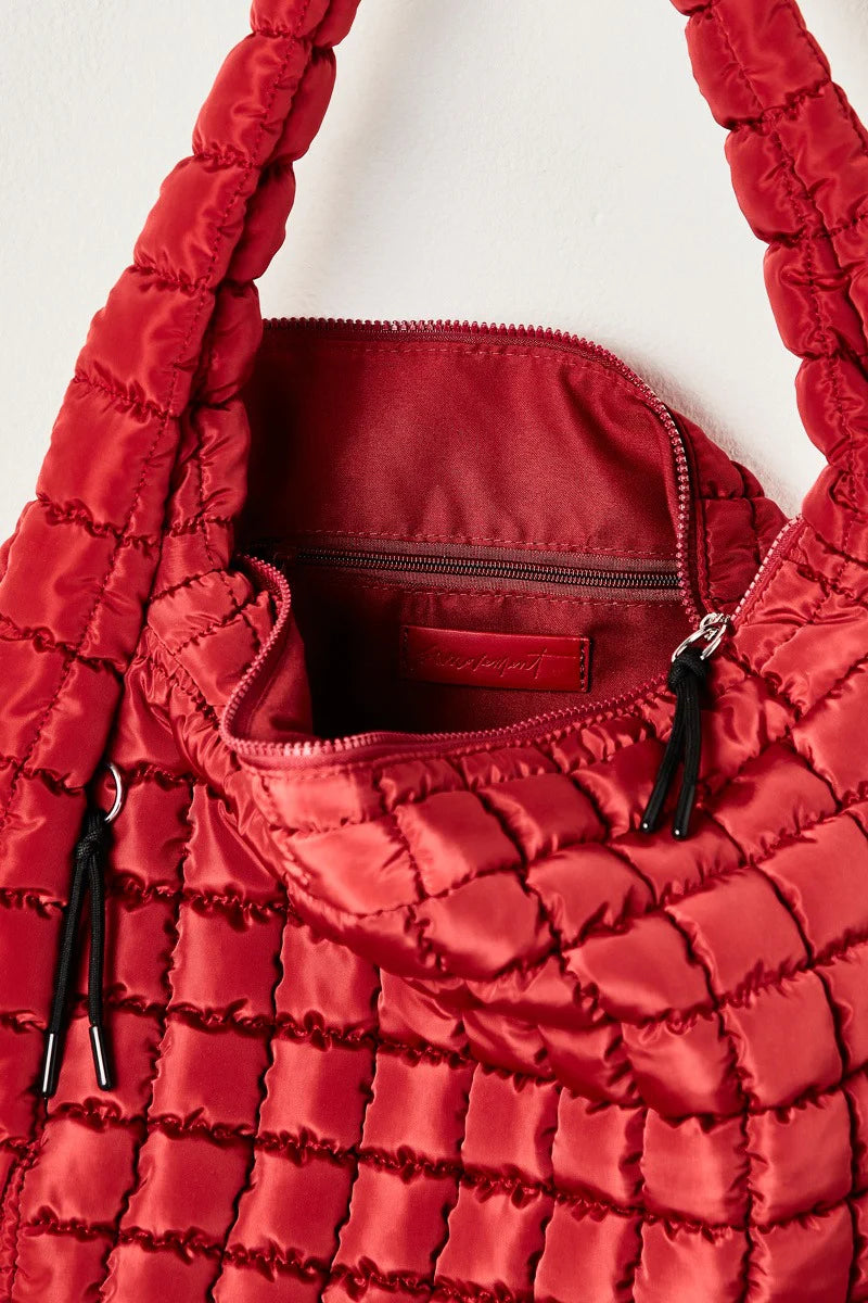 Free People Movement Quilted Carryall Bag in the color Red.