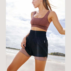 Free People Way Home Short in color black.
