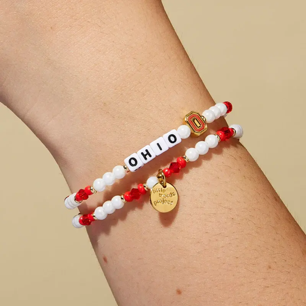 Bead bracelet from Little Words Project in the color scarlet and grey. Featuring the word, "Ohio", and the Ohio State University logo charm.