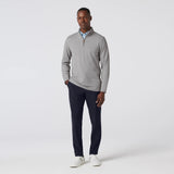 Grey men's golf quarter-zip sweater from the brand Mizzen+Main.