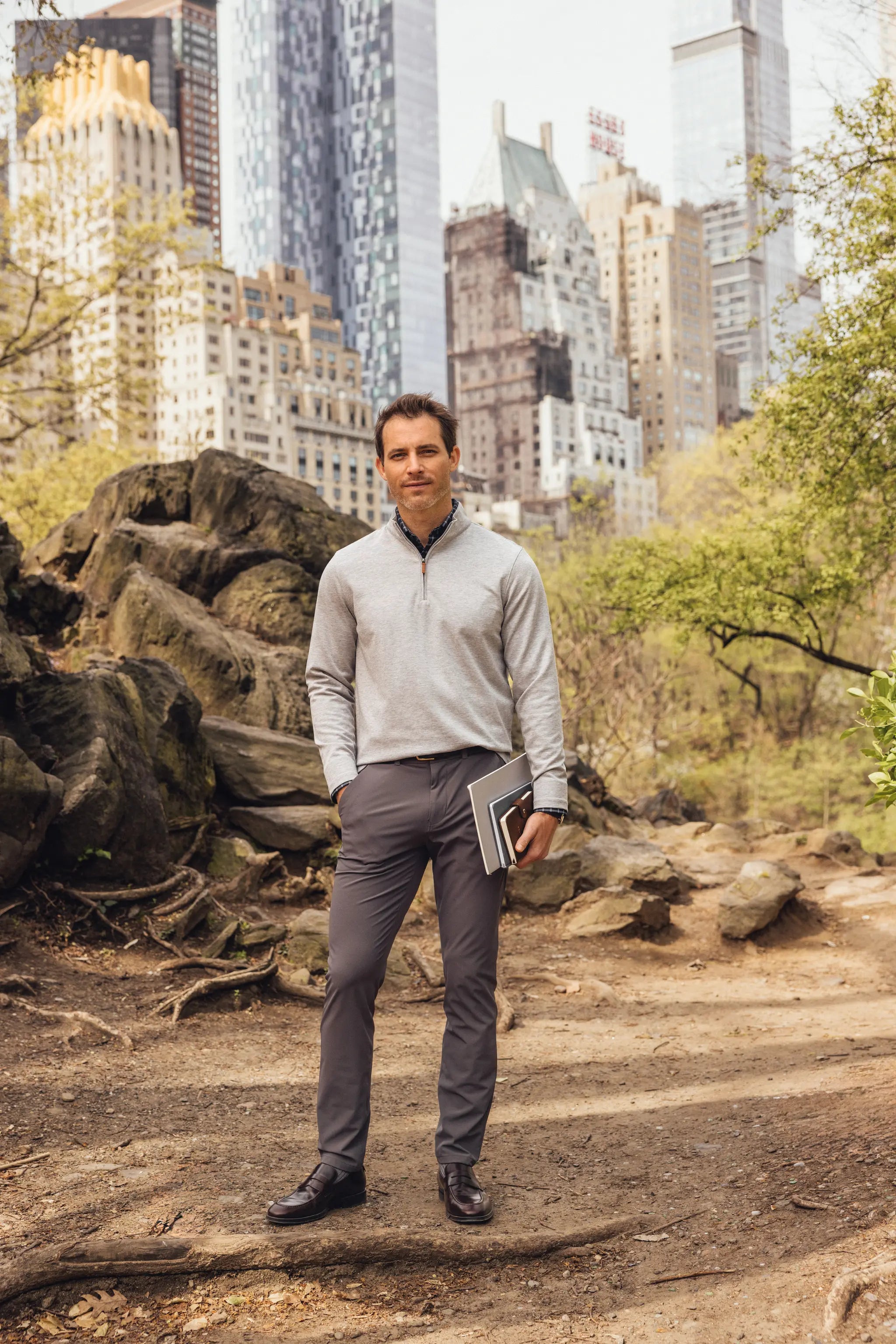 Grey men's golf quarter-zip sweater from the brand Mizzen+Main.