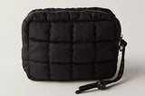 Quilted Mini Case in the color black from Free People Movement.