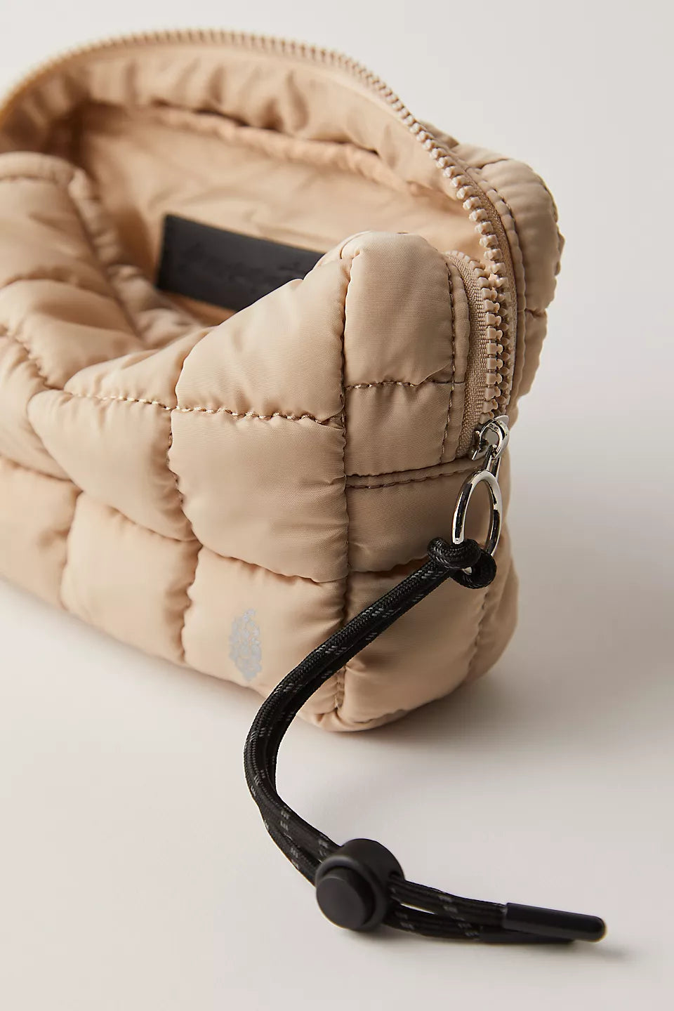 Quilted Mini Case in the color off-white from Free People Movement.