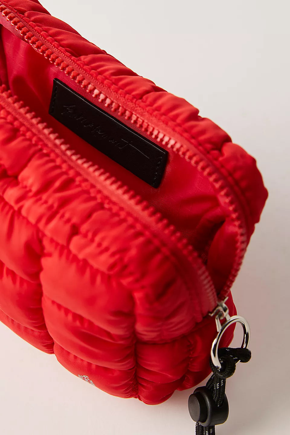 Quilted Mini Case in the color red from Free People Movement.