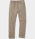 Front view of a pair of Comfort Terry Pant from The Normal Brand in the color taupe. The pants have two side pockets, and a button closure.