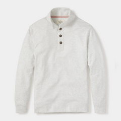 The front of a Puremeso Button Popover shirt from The Normal Brand. The shirt shows 3 buttons at the top, with a popped collar and long sleeves. Shown in the color stone.