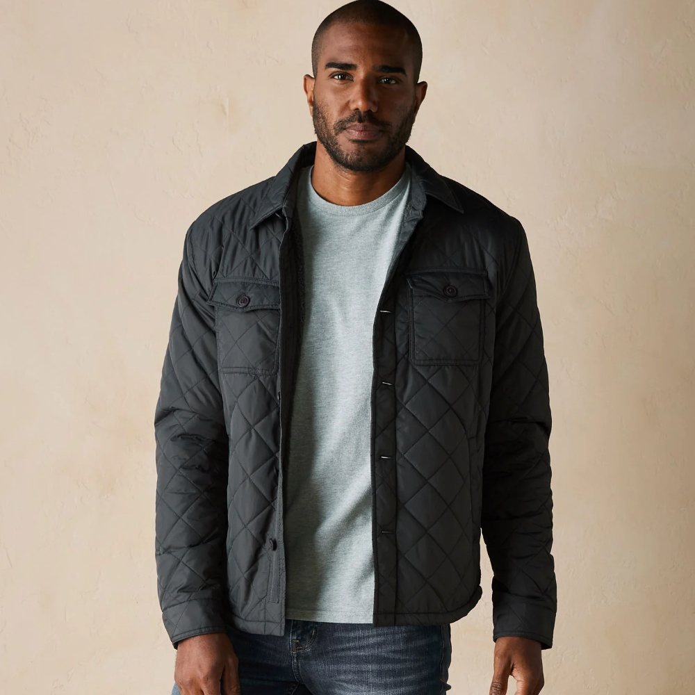 Quilted Sherpa Lined Shacket from The Normal Brand. The shacket is in the color charcoal.