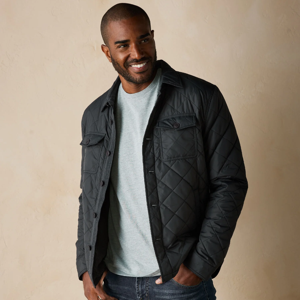 Quilted Sherpa Lined Shacket from The Normal Brand. The shacket is in the color charcoal.