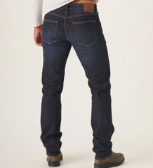 Back view of The Normal Jean from The Normal Brand in dark blue color.