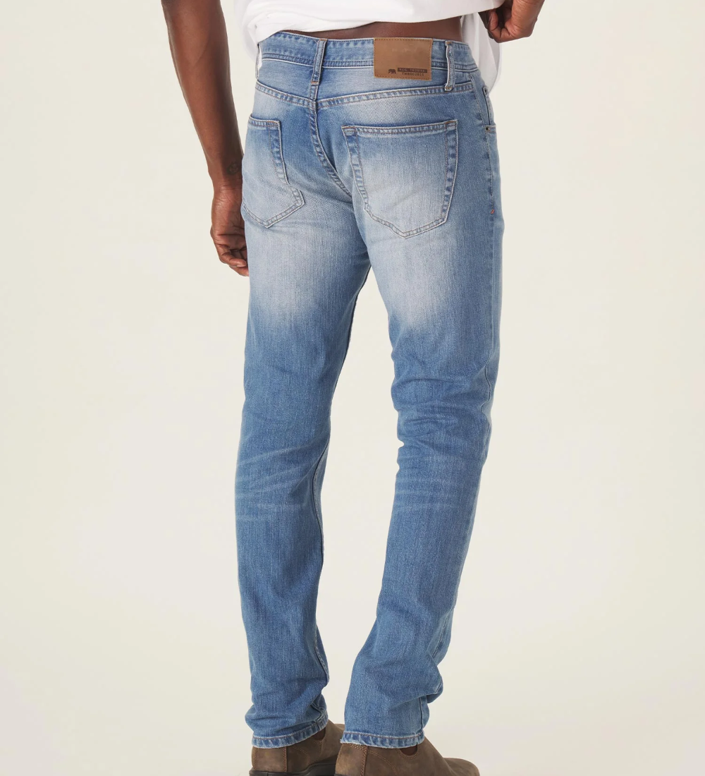 Back view of The Normal Jean from The Normal Brand in light wash color.