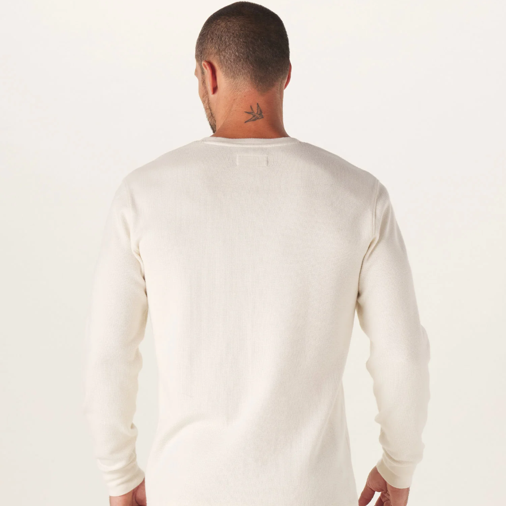 A back view of a white Vintage Thermal Crew sweater from The Normal Brand.