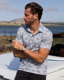 I can explain golf polo from TravisMathew in the color grey - 4