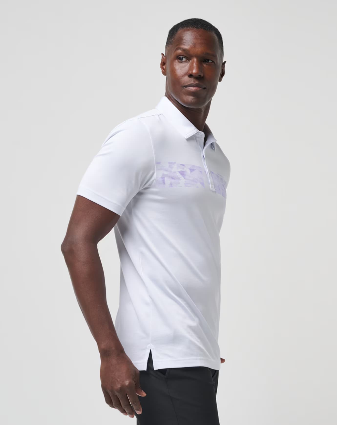 The TravisMathew Bigger Boat golf polo for men, in the color white.