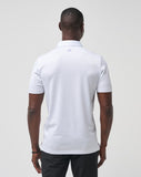 The TravisMathew Bigger Boat golf polo for men, in the color white.