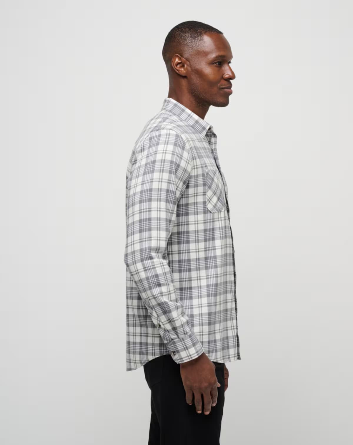 Men's flannel plaid shirt in the color white from the brand TravisMathew.