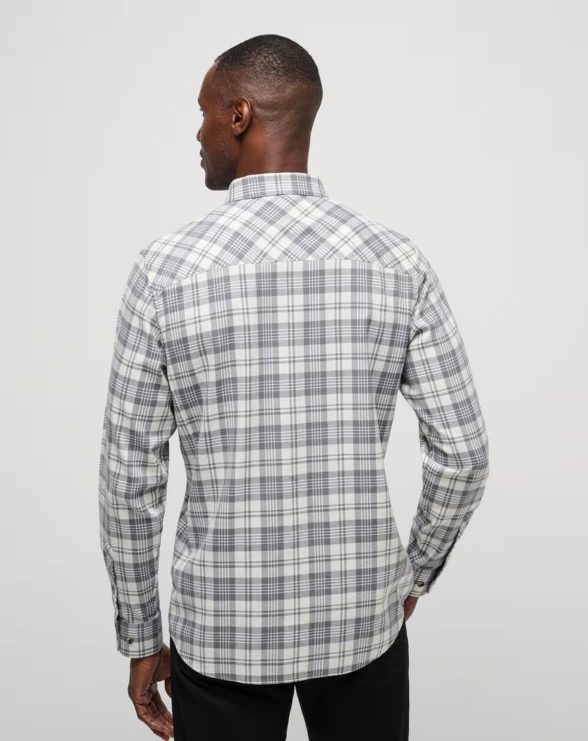 Men's flannel plaid shirt in the color white from the brand TravisMathew.