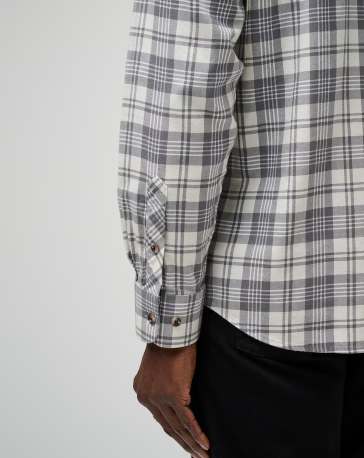 Men's flannel plaid shirt in the color white from the brand TravisMathew.