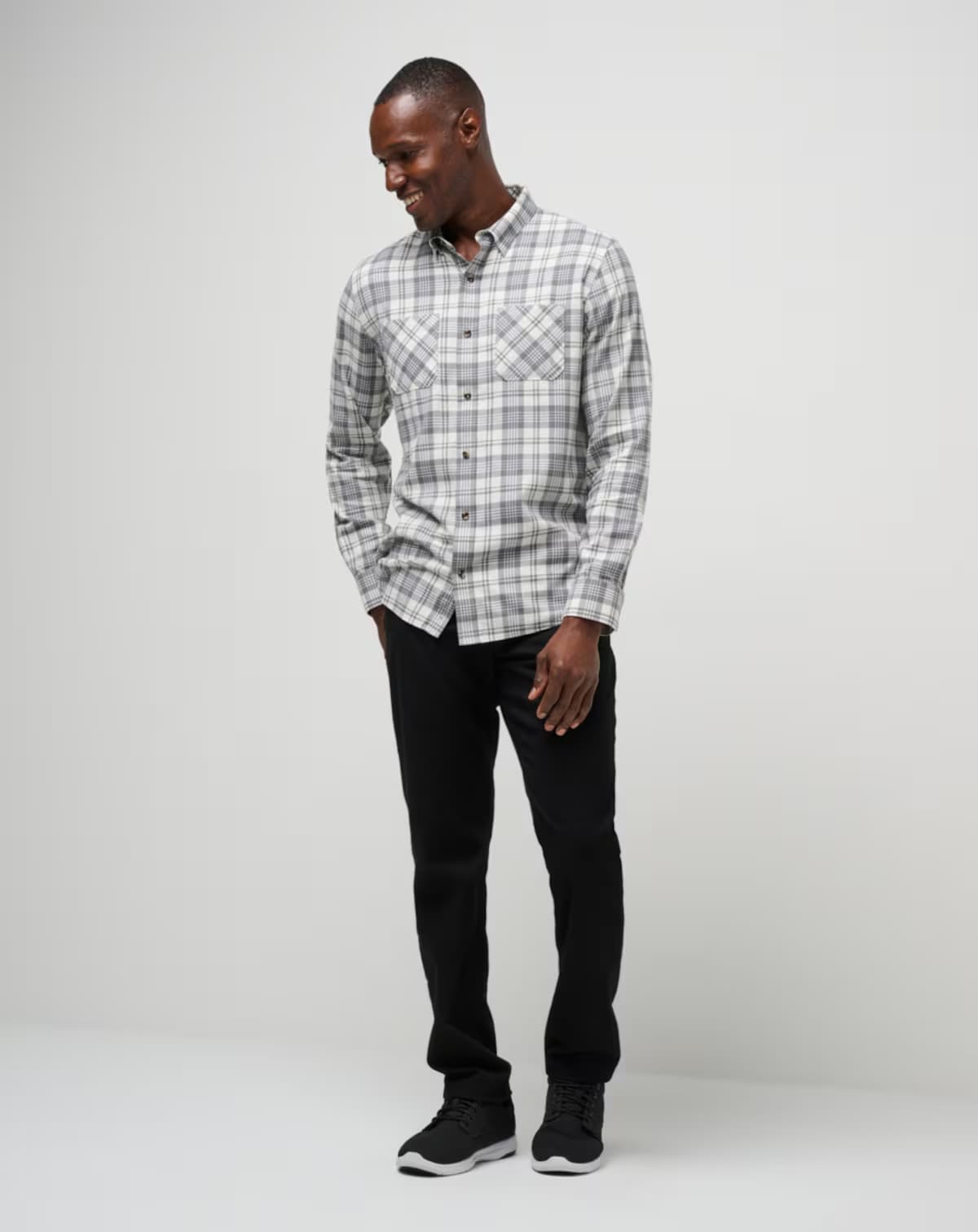 Men's flannel plaid shirt in the color white from the brand TravisMathew.