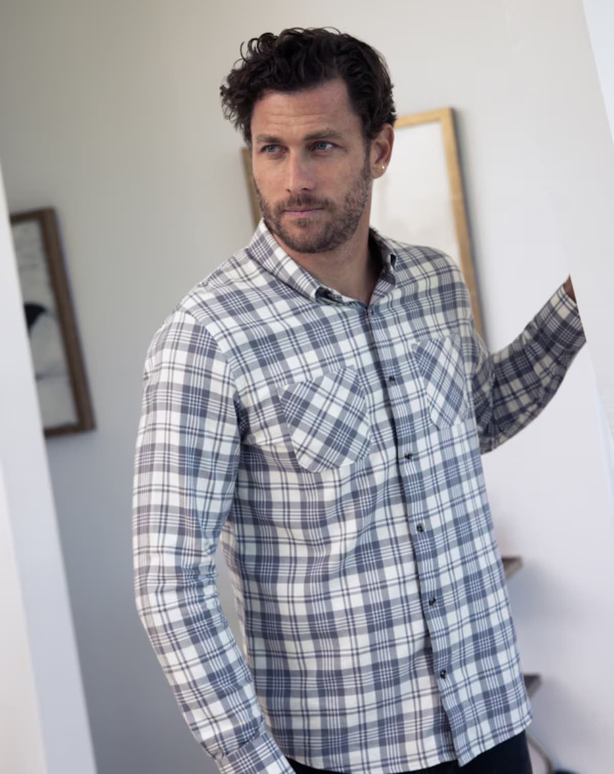 Men's flannel plaid shirt in the color white from the brand TravisMathew.