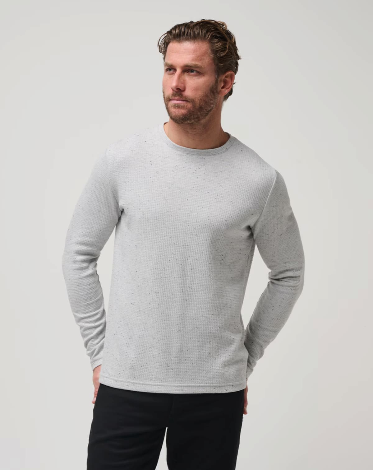 Waffle knit sweater for men from TravisMathew golf brand.