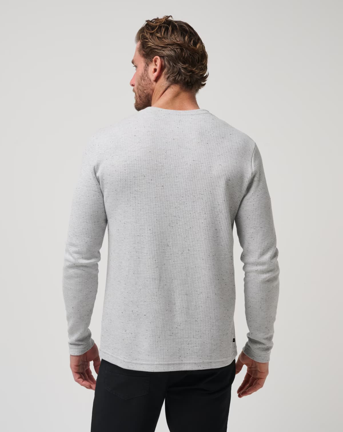 Waffle knit sweater for men from TravisMathew golf brand.