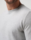 Waffle knit sweater for men from TravisMathew golf brand.