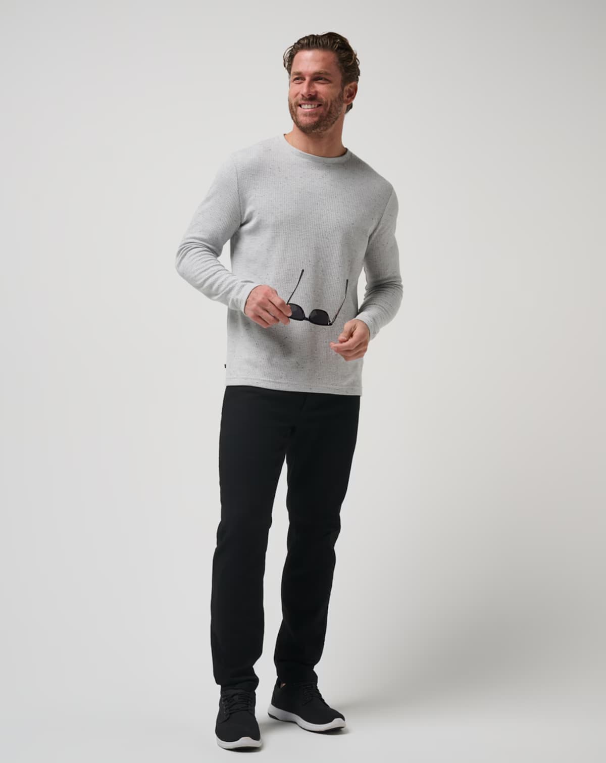 Waffle knit sweater for men from TravisMathew golf brand.