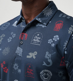 A TravisMathew golf polo in the color blue, with golf simples, drinking simpples, and "here for a good time" across the entire shirt. Titled the Julyin Polo.