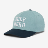 TravisMathew hat that reads, Golf Nerd, in the color blue, with a darker shade of blue on the bill of the cap.