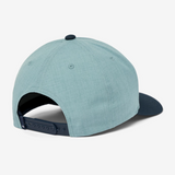 TravisMathew hat that reads, Golf Nerd, in the color blue, with a darker shade of blue on the bill of the cap.