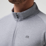 A Upgraded Pullover Sweater from TravisMathew in the color Heather Grey.