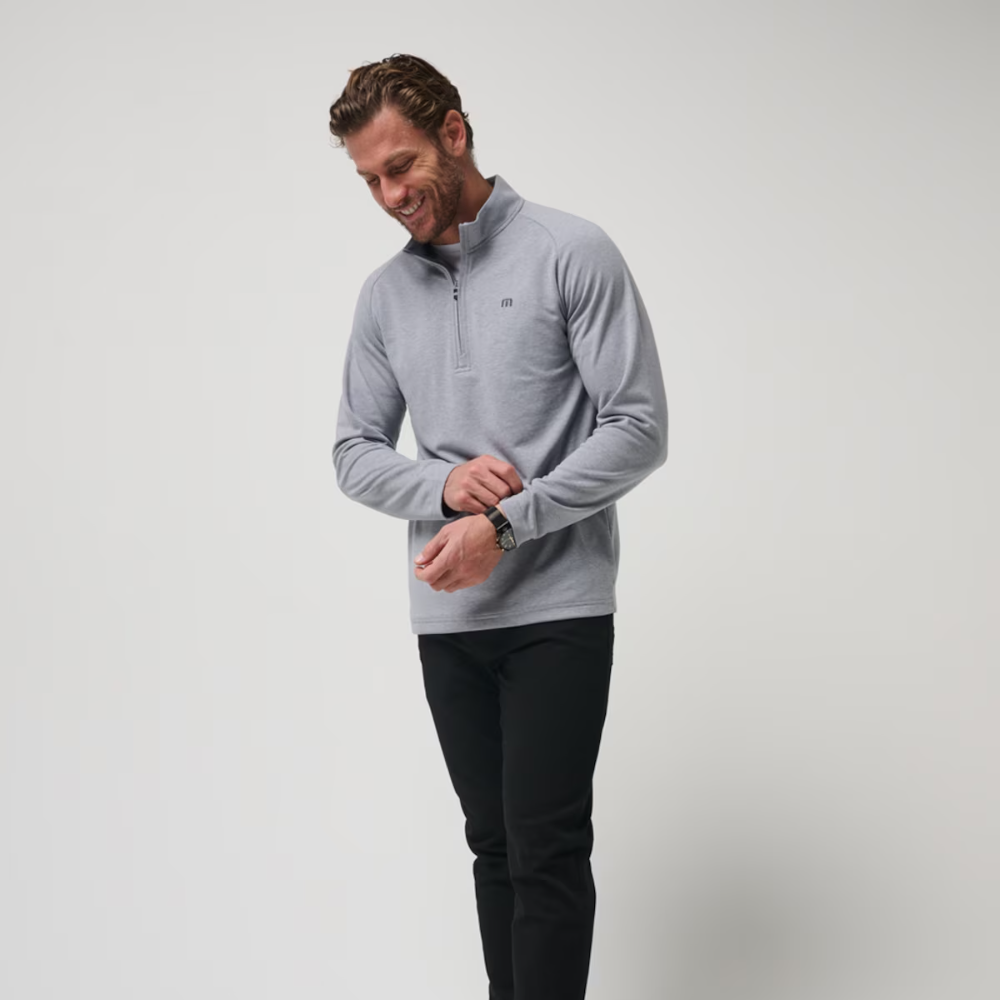 A Upgraded Pullover Sweater from TravisMathew in the color Heather Grey.