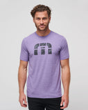 The TravisMathew Waina Short Sleeve Tee in the color purple.