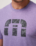 The TravisMathew Waina Short Sleeve Tee in the color purple.