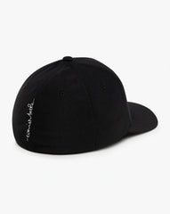 A black TravisMathew golf hat, with the TravisMathew logo.