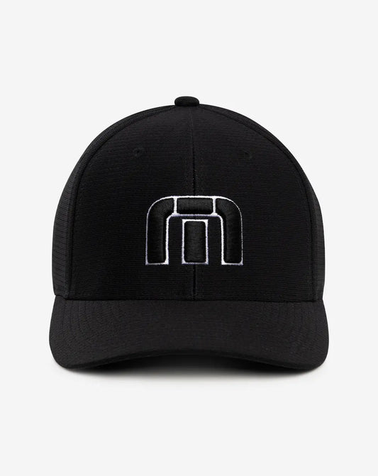 A black TravisMathew golf hat, with the TravisMathew logo. 1000