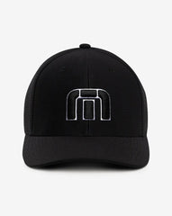 A black TravisMathew golf hat, with the TravisMathew logo.