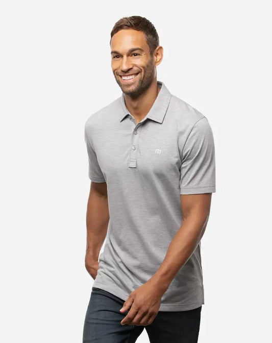TravisMathew The Zinna Polo in the color heather grey. 700