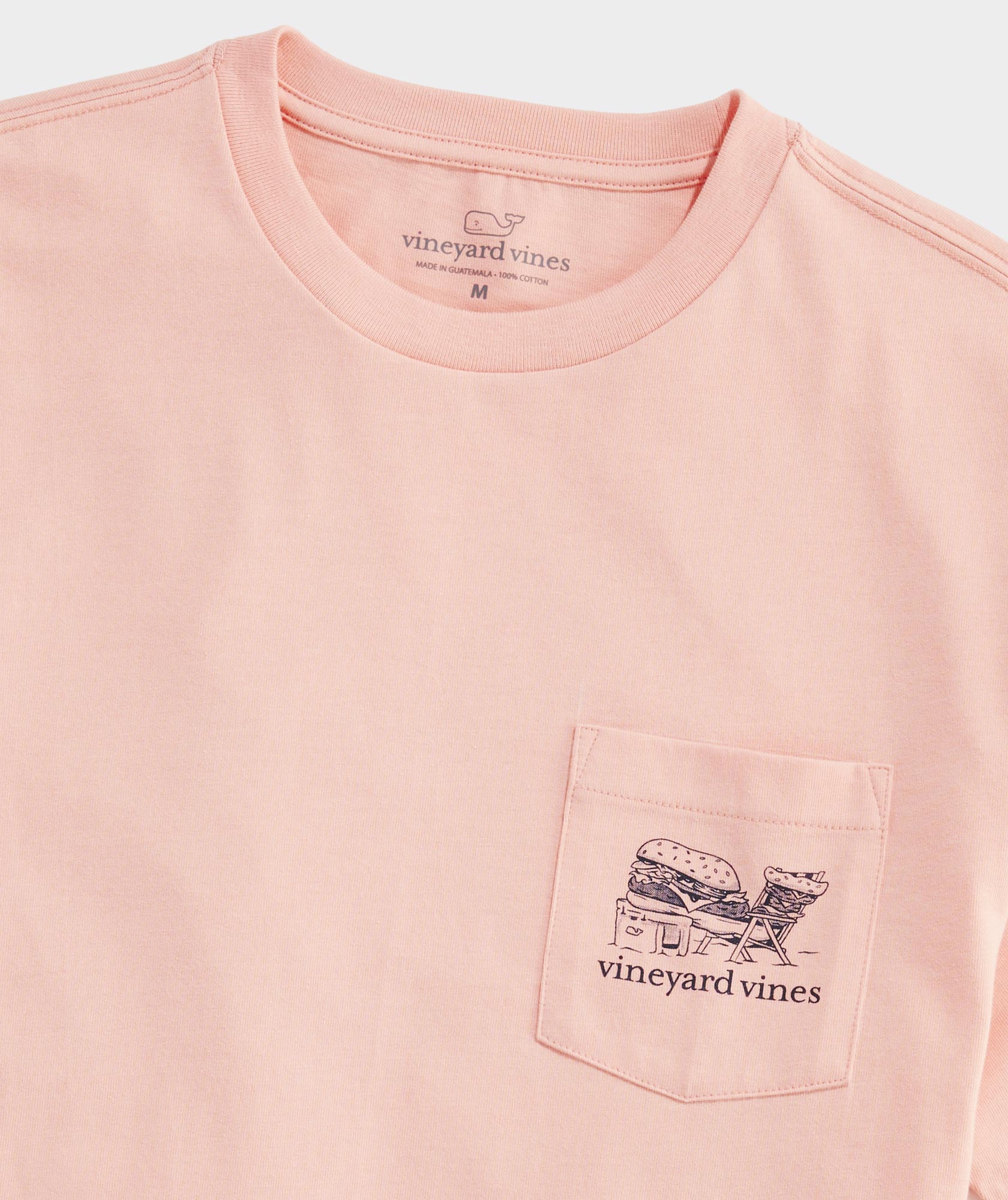 A men's Vineyard Vines T-Shirt that reads, Bite into Paradise.