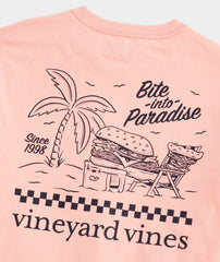 A men's Vineyard Vines T-Shirt that reads, Bite into Paradise.