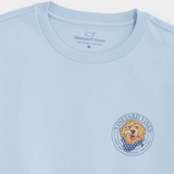 Blue colored t-shirt from Vineyard Vines with a puppy dog logo. The dog is wearing a patriotic bandana.