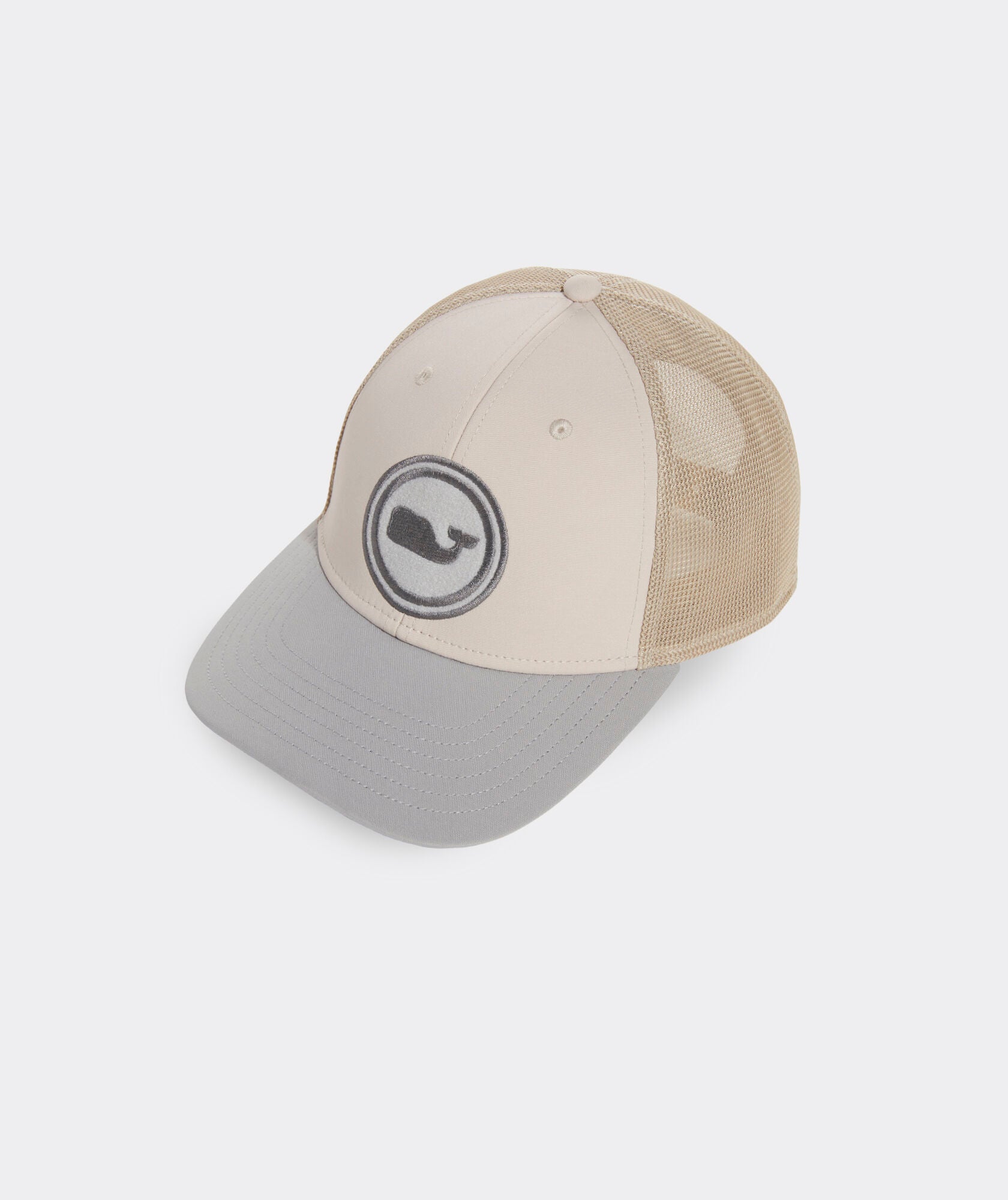 A Vineyard Vines Velcro Whale Dot Patch Perf Trucker in the color tan.