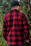 A red plaid shacket being worn by a Burlebo model with a Burlebo hat on. 